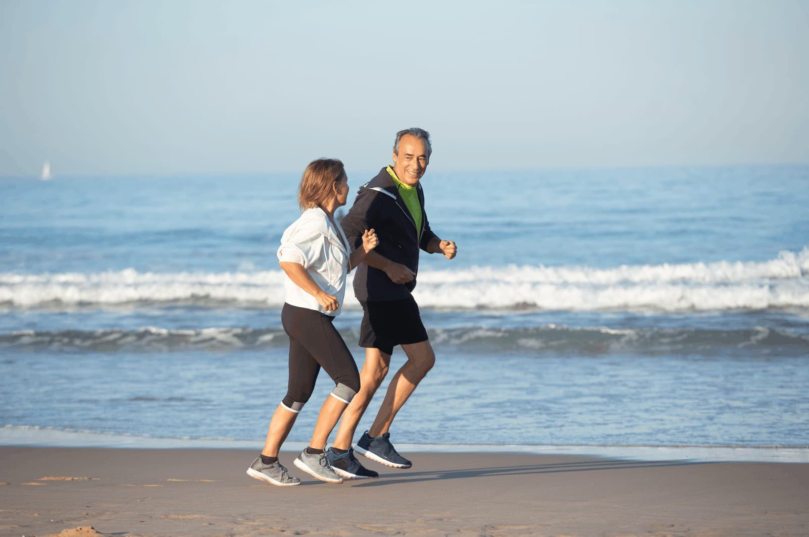 A person walking briskly on a path, illustrating daily step counts and health
