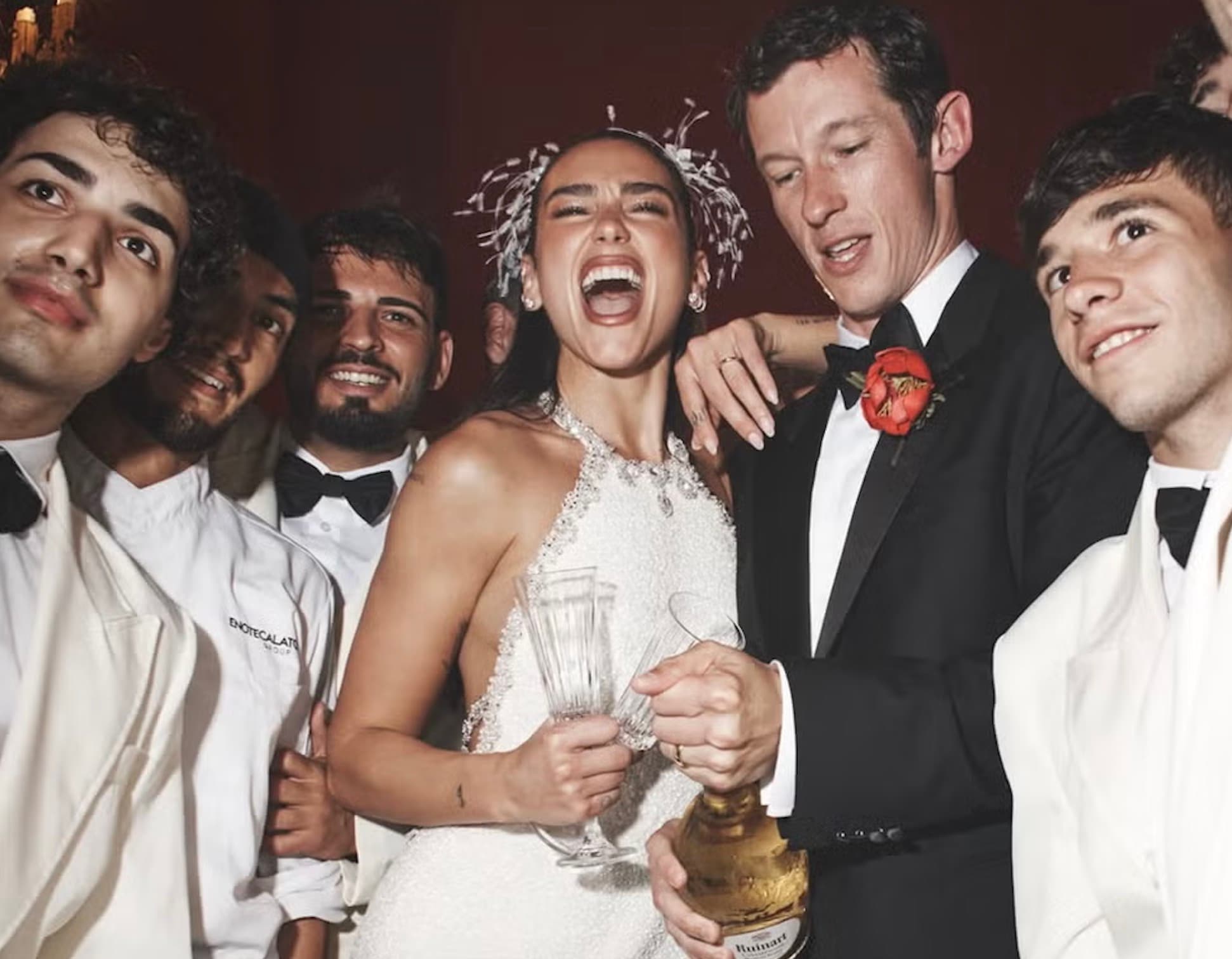 Dua Lipa and Callum Turner celebrating with friends and Ruinart champagne at their Sicily wedding