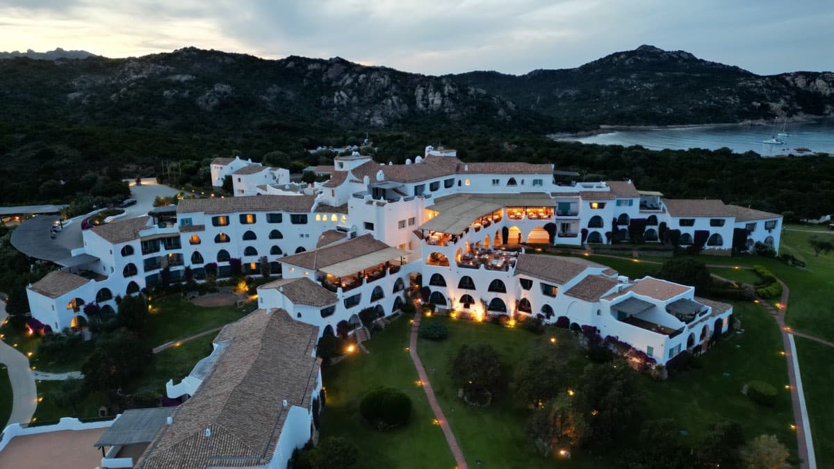 Aerial view of the Romazzino, A Belmond Hotel, at dusk on the Costa Smeralda in Porto Cervo