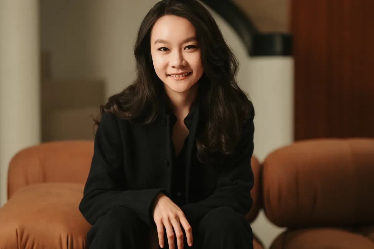 Cecilia Shen, founder of Utopai Studios, seated and smiling