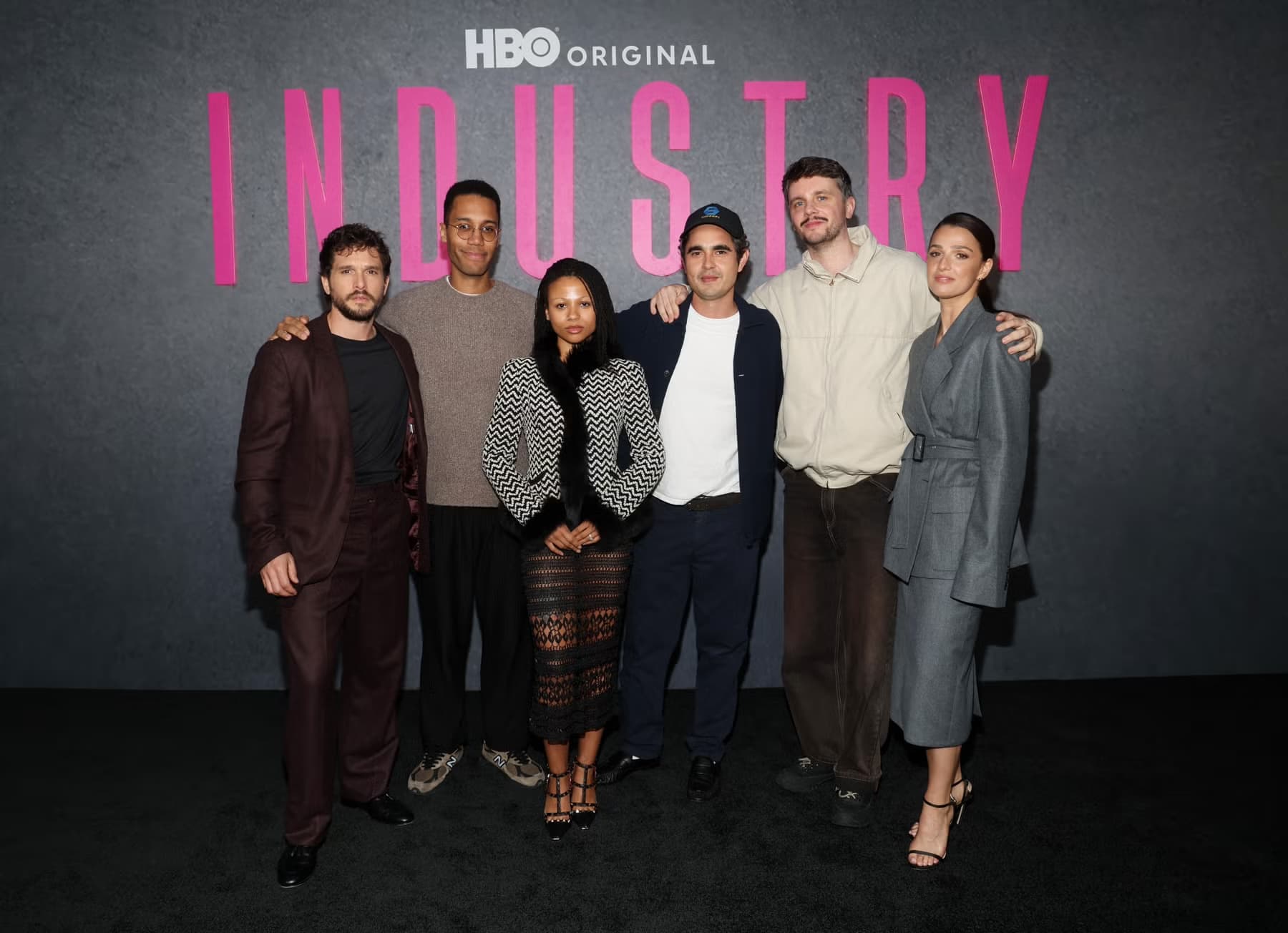 The cast of HBO's Industry photographed together at an event